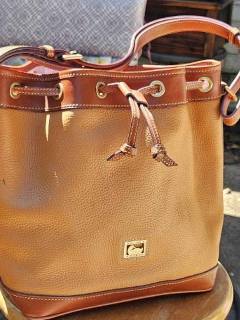Dooney & Bourke Dillen  Pebble Leather Drawstring Tote in Peanut Brittle. YUM!